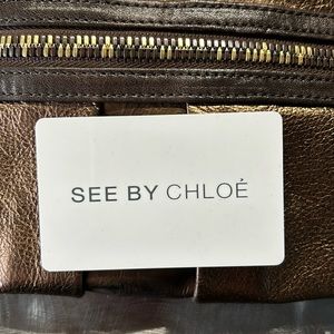 See by Chloe clutch bag